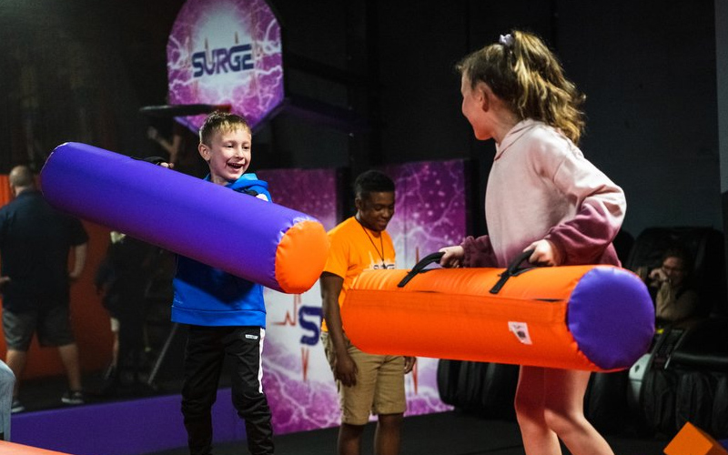 Balance Beam Challenge in Spanish Indoor Trampoline Park