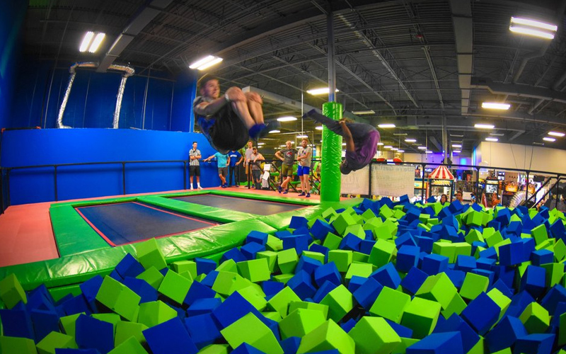 Foam pit trampoline offers a safe space for aerial tricks.