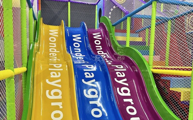 Bright and colorful slide attracting young visitors