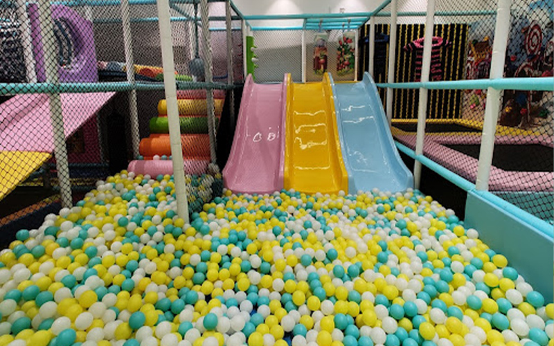 Colorful kids slide area inside the toddler play zone