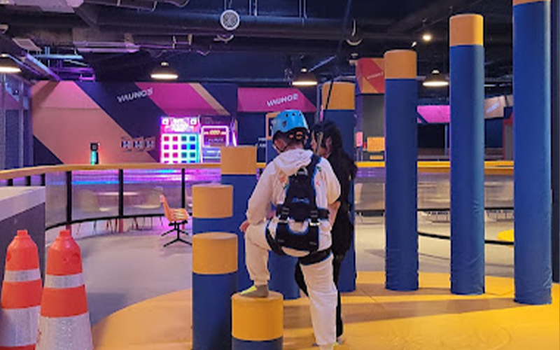 Kids obstacle game section inside the trampoline jump park