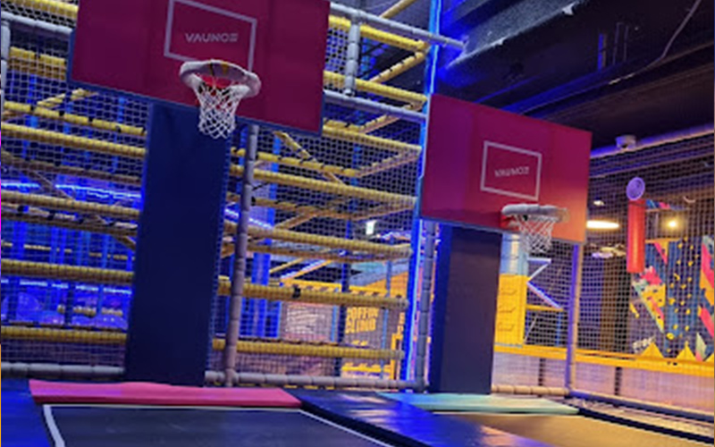 Trampoline basketball court attracting kids and teens