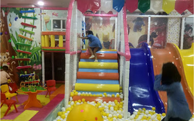 Children exploring the maze play area in Thailand playground park