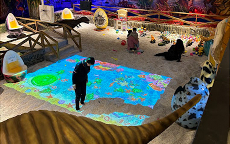 Kids’ sand pool providing a relaxing activity zone