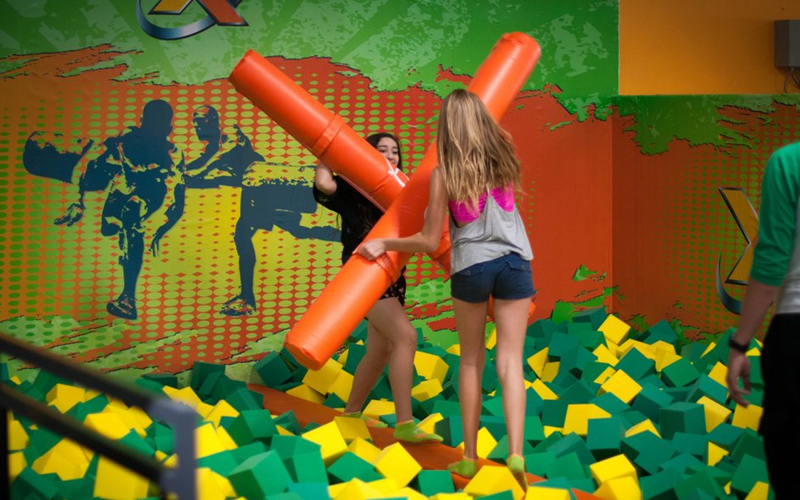 Trampoline balance beam games offering laughter and challenges
