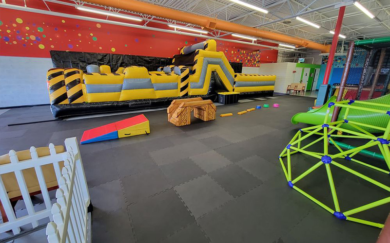 Colorful kids’ inflatable castle bringing energy and fun indoors