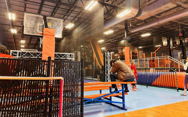 Exciting trampoline basketball games inside the indoor trampoline park