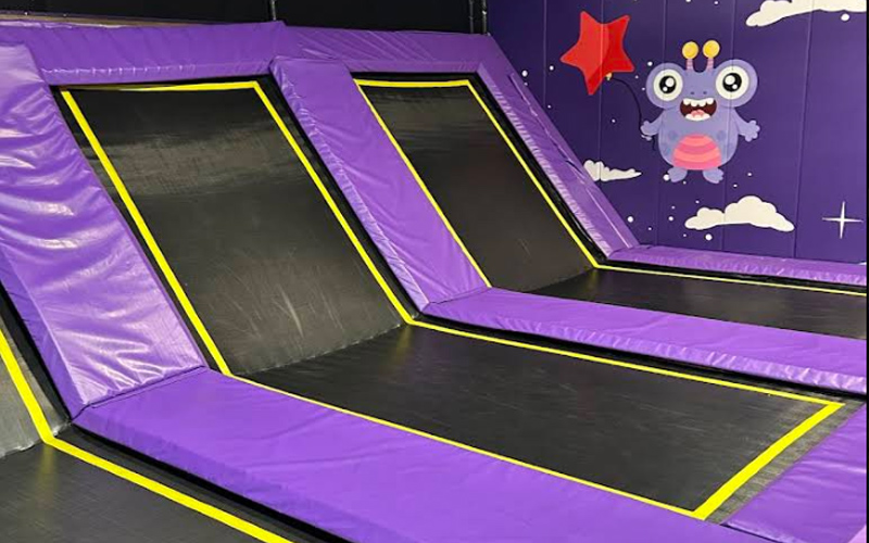 Slope trampoline area adding unique movement and thrills