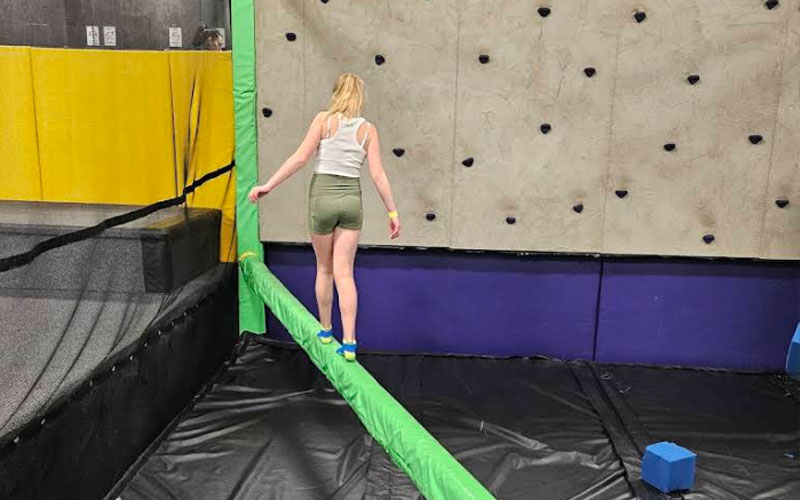 Balance beam over foam pit adds excitement and competition