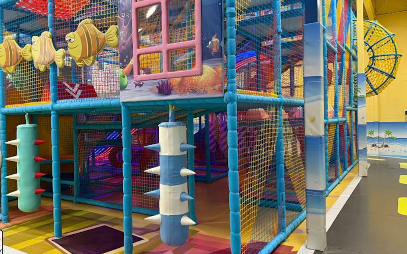Children exploring the maze play area in Nebraska