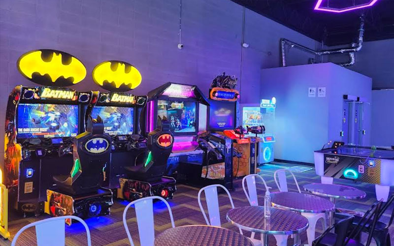Families bonding in the exciting arcade game area