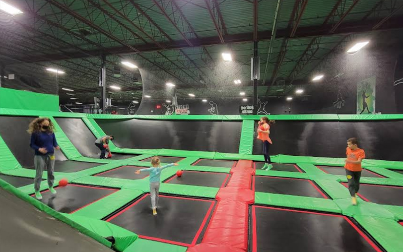 Trampoline dodgeball arena creating group competition and excitement