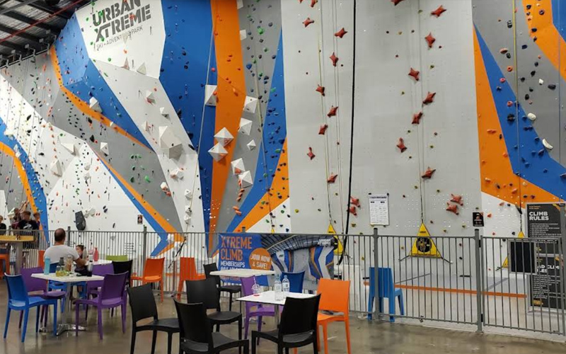 Rock climbing game area encouraging challenge and adventure