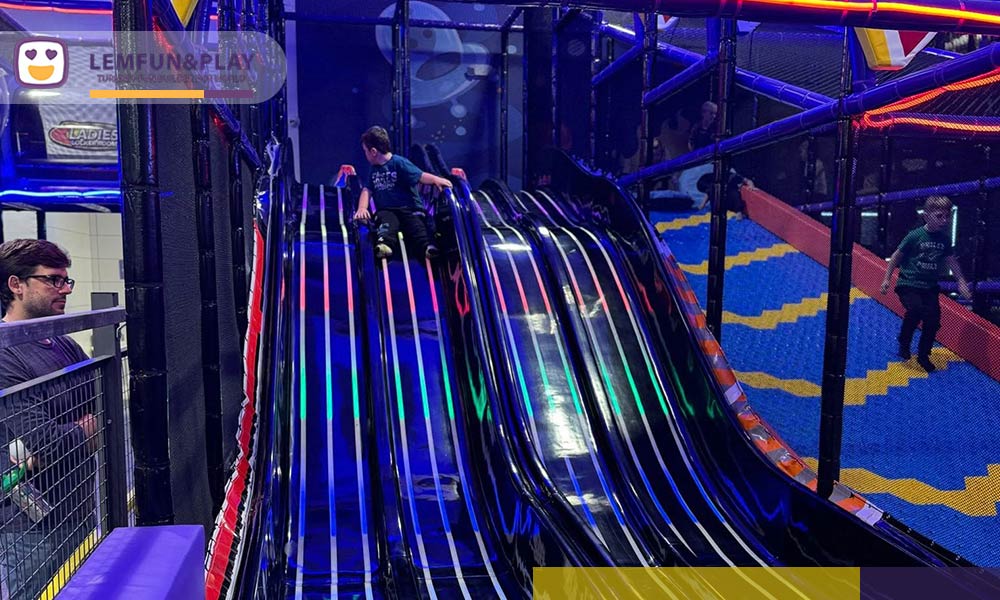 An optimized commercial indoor playground layout that improves visibility, allowing fewer staff members to monitor the trampoline park and ball pit areas safely.