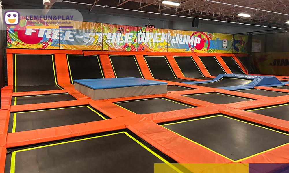 Comparison of a non-compliant indoor playground design blocking fire exits vs Lemfun's safety-approved layout for Canadian building codes.