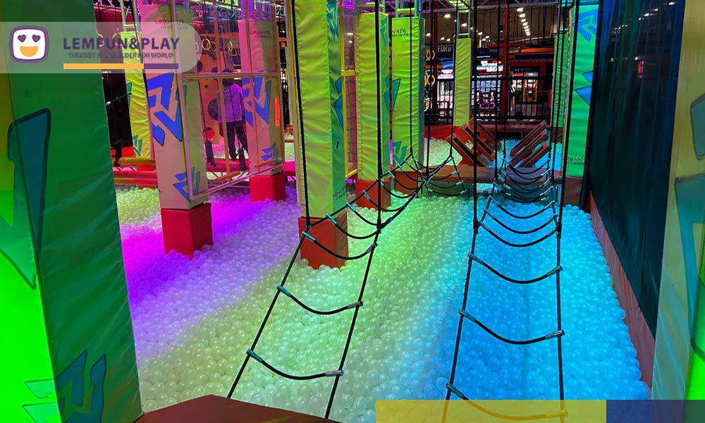 Lemfun installation team managing urgent air-freighted components to ensure on-time opening for a turnkey indoor playground project in Calgary.