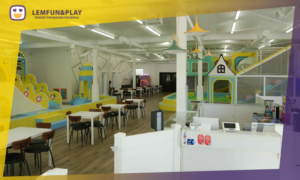 A comprehensive overview of a 5,000 sq ft indoor playground center featuring a trampoline park, slides, and multi-level play structures.