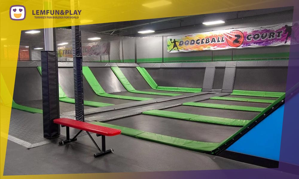 Spacious free trampoline area for open jumping and aerobic exercise in a commercial park.