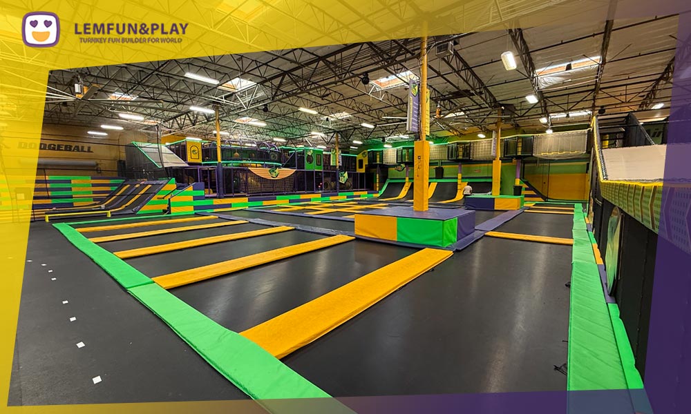 Professional free jump trampoline area featuring high-tensile mats and safety padding for commercial facilities.