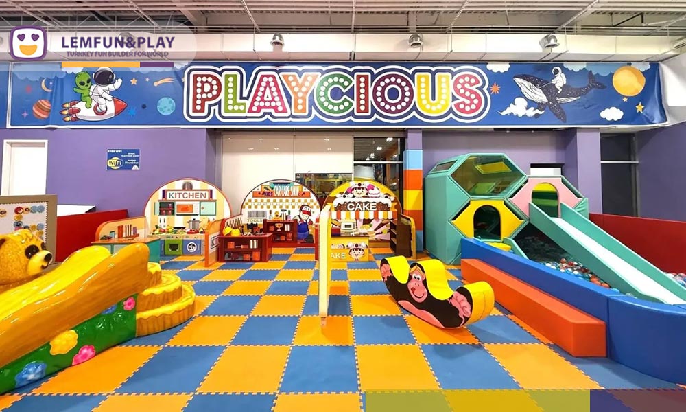 Pastel-colored soft play area for toddlers featuring sensory panels and foam climbers at Playcious Mississauga.
