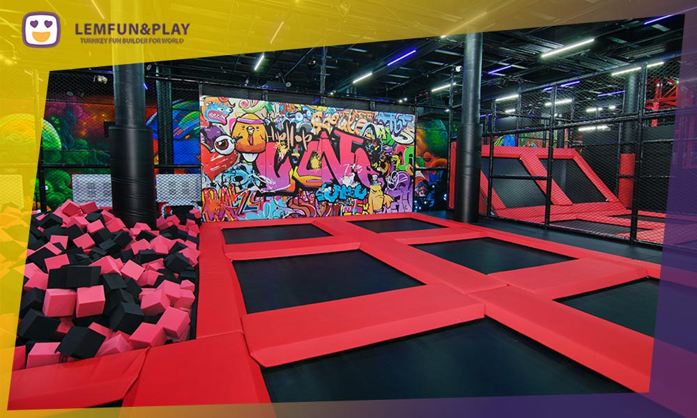 Full panoramic layout overview of a high-yield multi-attraction commercial indoor trampoline park and family entertainment center.