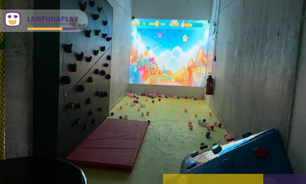 High-energy interactive game area designed to encourage cognitive problem-solving within the Jungle Themed Indoor Play Center in Switzerland.