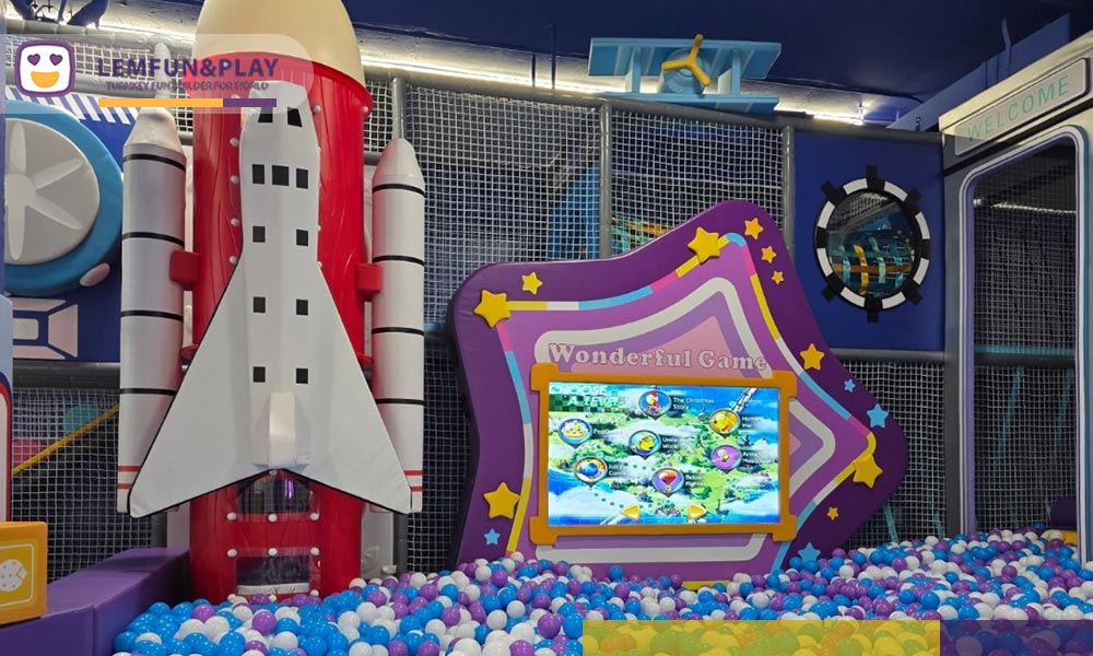 Pastel colored multi-level maze and kids ball pool designed by a commercial indoor playpark equipment supplier.