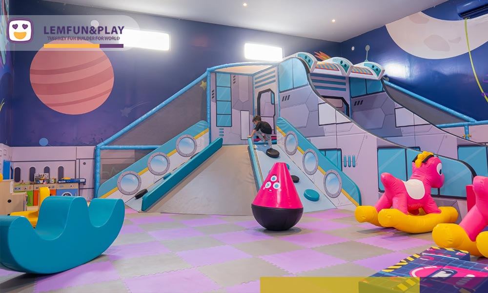Dedicated space shuttle toddler soft playhouse with low-sloped climbs and soft padded rockers inside Aeroxspace Adventure in Bali